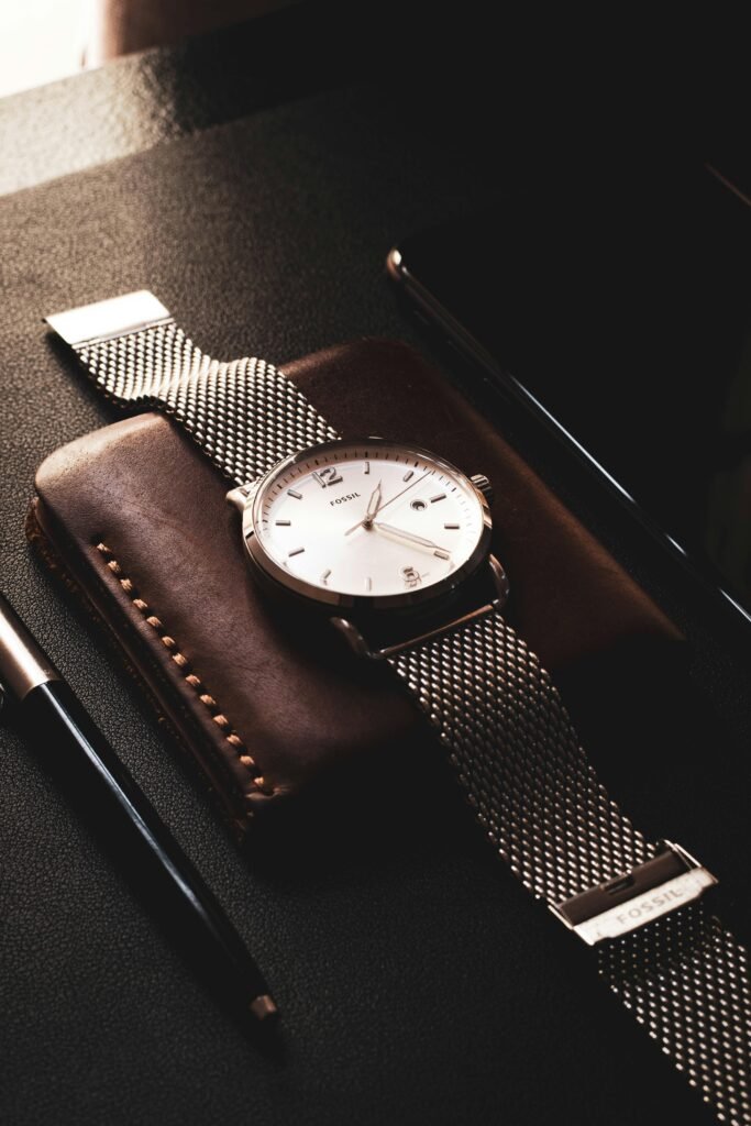 A men's watch laying flat