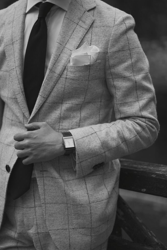 Man wearing suit highlighting pocket square